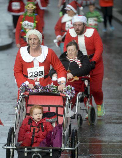 The Spirit of Christmas : The Rotary Club of Gloucester Santa Fun Run held in Gloucester City centre on Saturday 9th December 2023. Credit to PAUL NICHOLLS PHOTOGRAPHY www.paulnichollsphotography.com available for PRESS/PR/EVENT/ROYAL and VIP VISITS/CORPORATE/WEBSITE Photography tel 07718 152168 www.paulnichollsphotography.com