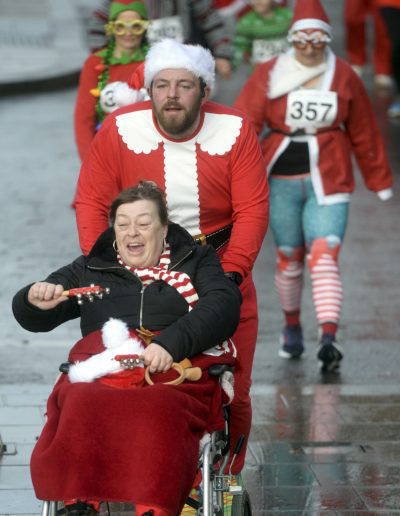 The Spirit of Christmas : The Rotary Club of Gloucester Santa Fun Run held in Gloucester City centre on Saturday 9th December 2023. Credit to PAUL NICHOLLS PHOTOGRAPHY www.paulnichollsphotography.com available for PRESS/PR/EVENT/ROYAL and VIP VISITS/CORPORATE/WEBSITE Photography tel 07718 152168 www.paulnichollsphotography.com